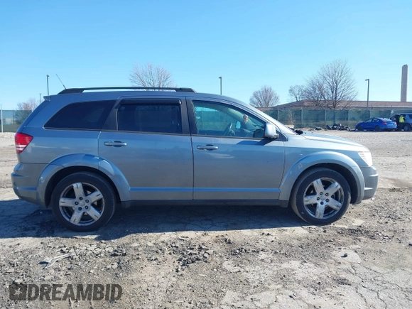 2010 Dodge Journey SXT with VIN 3D4PH5FVXAT107023, listed as a IAAI auction lot 41747572 with 165,568 mi miles and . Bid and sale history available at DreamBid. Image 12.