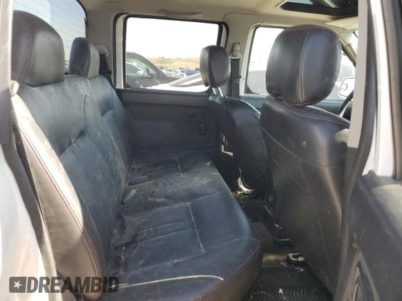 2002 Nissan Frontier SC z VIN 1N6MD29Y52C369414, wystawiony jako Copart lot #58532505 z przebiegiem 249 926 mil mil oraz Szkoda całkowita • Salvage title. Historia ofert i sprzedaży dostępna na DreamBid. Obrazek 10.