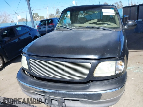2002 Ford F-150 XL with VIN 1FTRX17WX2NB99454, listed as a IAAI auction lot 41643850 with 180,149 mi miles. Bid and sale history available at carsss.com. Image 12.