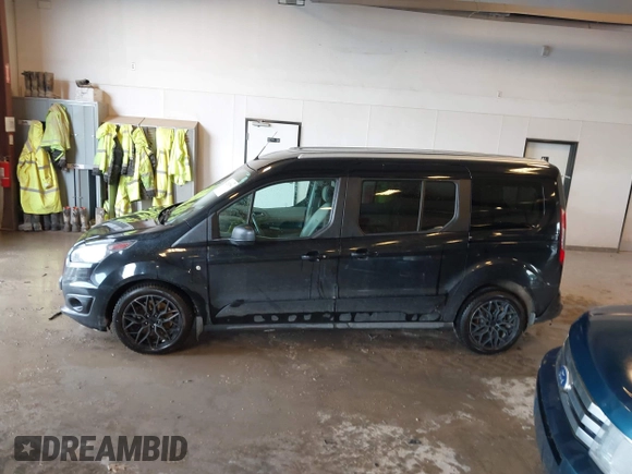 2015 Ford Transit Connect XLT z VIN NM0GE9F74F1223912, wystawiony jako IAAI lot #42597596 z przebiegiem 171 682 mil mil oraz . Historia ofert i sprzedaży dostępna na DreamBid. Obrazek 14.