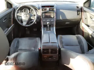 2015 Mazda CX-9 Grand Touring z VIN JM3TB3DV2F0456130, wystawiony jako Copart lot #60545095 z przebiegiem 120 892 mil mil oraz Szkoda całkowita • Salvage title. Historia ofert i sprzedaży dostępna na DreamBid. Obrazek 8.