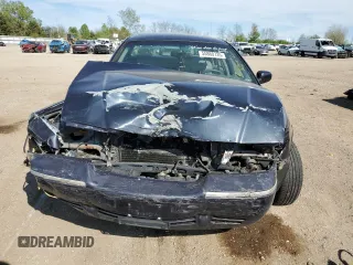 1999 Mercury Grand Marquis LS z VIN 2MEFM75W1XX635839, wystawiony jako Copart lot #55860735 z przebiegiem 114 963 mil mil oraz Szkody całkowita. Historia ofert i sprzedaży dostępna na DreamBid. Obrazek 5.