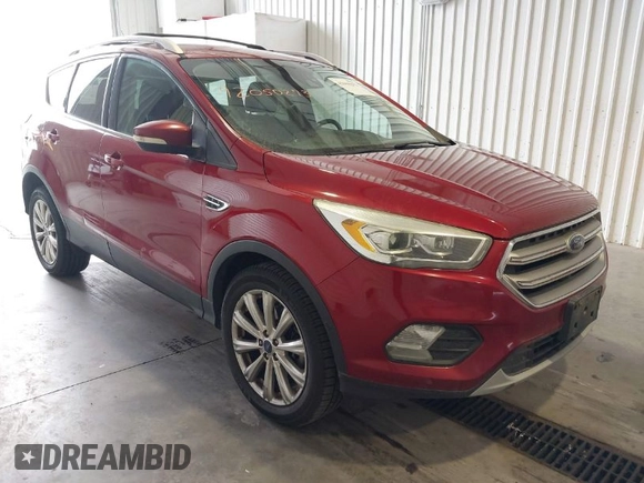 2017 Ford Escape Titanium with VIN 1FMCU9J91HUA32264, listed as a IAAI auction lot 42050273 with 201,128 mi miles. Bid and sale history available at carsss.com. Image 1.