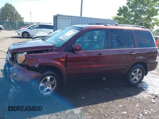 2007 Honda Pilot EX-L with VIN 5FNYF18547B006094, listed as a IAAI auction lot 42297719 with 235,632 mi miles and . Bid and sale history available at DreamBid. Image 14.
