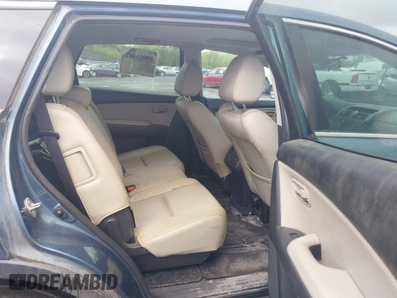 2014 Mazda CX-9 Touring with VIN JM3TB3CV1E0447130, listed as a IAAI auction lot 40815387 with 148,985 mi miles. Bid and sale history available at carsss.com. Image 8.