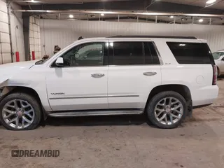 2015 GMC Yukon SLE with VIN 1GKS2AKC6FR103447, listed as a IAAI auction lot 41596220 with 104,209 mi miles. Bid and sale history available at carsss.com. Image 14.
