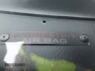 2002 Mazda MX-5 Miata Cloth z VIN JM1NB353420221527, wystawiony jako IAAI lot #41909623 z przebiegiem 90 260 mil mil oraz . Historia ofert i sprzedaży dostępna na DreamBid. Obrazek 12.
