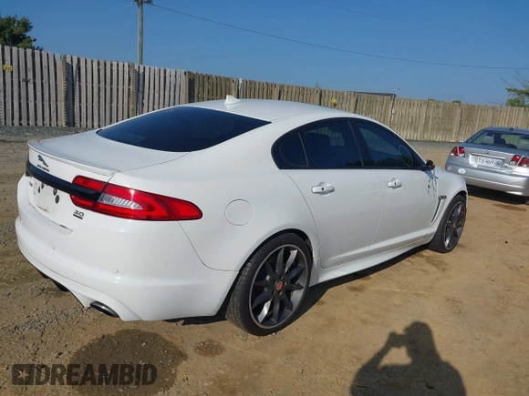 2015 Jaguar XF V6 Portfolio with VIN SAJWJ0FF4F8U72149, listed as a IAAI auction lot 40386903 with 49,055 mi miles. Bid and sale history available at carsss.com. Image 4.