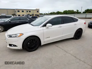 2014 Ford Fusion Titanium Hybrid with VIN 3FA6P0RU3ER396661, listed as a Copart auction lot 63697235 with 174,768 mi miles and Clean title. Bid and sale history available at DreamBid. Image 1.