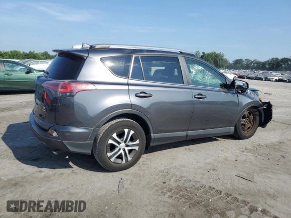 2017 Toyota RAV4 LE with VIN JTMBFREV2HD204349, listed as a Copart auction lot 63006825 with 141,795 mi miles and Salvage title. Bid and sale history available at DreamBid. Image 3.