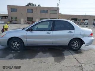 2004 Mitsubishi Lancer ES with VIN JA3AJ26E54U052124, listed as a IAAI auction lot 41804473 with 165,786 mi miles. Bid and sale history available at carsss.com. Image 15.