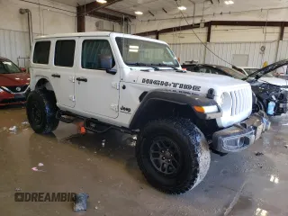 2023 Jeep Wrangler Sport S with VIN 1C4HJXDG3PW635415, listed as a Copart auction lot 48016565 with 31,494 mi miles and Salvage Title. Bid and sale history available at DreamBid. Image 4.