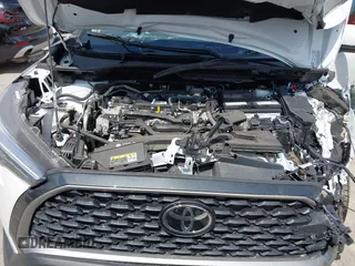 2024 Toyota Corolla Cross XLE with VIN 7MUDAAAG5RV097731, listed as a IAAI auction lot 42227874 with 9,151 mi miles and . Bid and sale history available at DreamBid. Image 10.