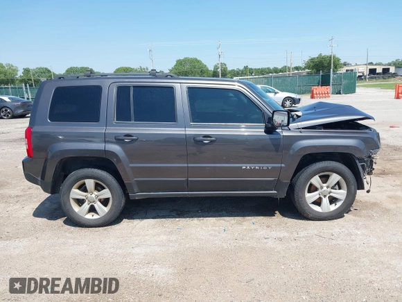2014 Jeep Patriot Latitude with VIN 1C4NJRFB4ED799037, listed as a IAAI auction lot 42458807 with 105,936 mi miles and . Bid and sale history available at DreamBid. Image 14.