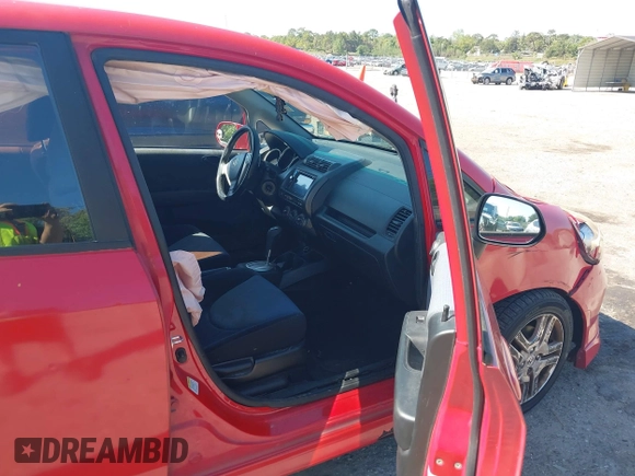 2007 Honda Fit Sport with VIN JHMGD38657S014356, listed as a IAAI auction lot 41942268 with 198,852 mi miles. Bid and sale history available at carsss.com. Image 5.
