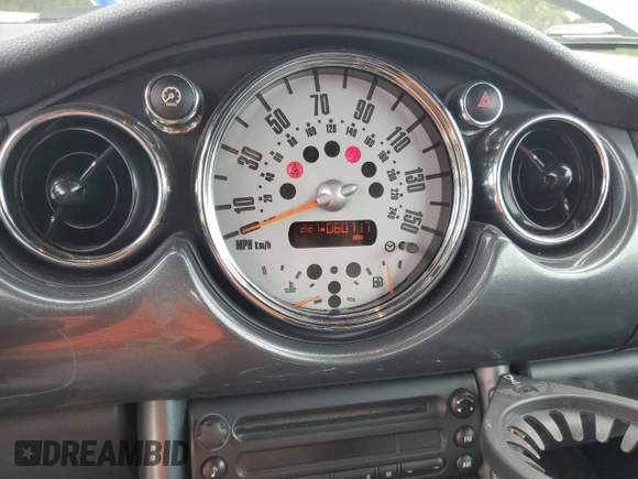 2007 MINI Convertible S with VIN WMWRH33567TJ45123, listed as a Copart auction lot 55702735 with 60,117 mi miles and Salvage title. Bid and sale history available at DreamBid. Image 9.