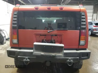 2003 Hummer H2 z VIN 5GRGN23U03H113929, wystawiony jako Copart lot #49540455 z przebiegiem 126 254 mil mil oraz Tytuł czysty. Historia ofert i sprzedaży dostępna na DreamBid. Obrazek 6.