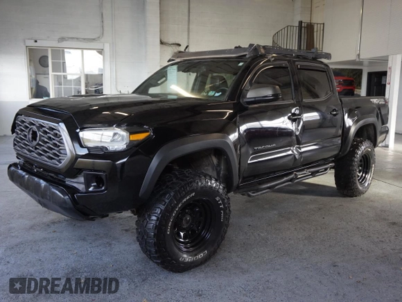 2021 Toyota Tacoma SR z VIN 3TMCZ5AN3MM420851, wystawiony jako Copart lot #55668255 z przebiegiem 61 329 mil mil oraz Szkoda całkowita • Salvage title. Historia ofert i sprzedaży dostępna na DreamBid. Obrazek 2.