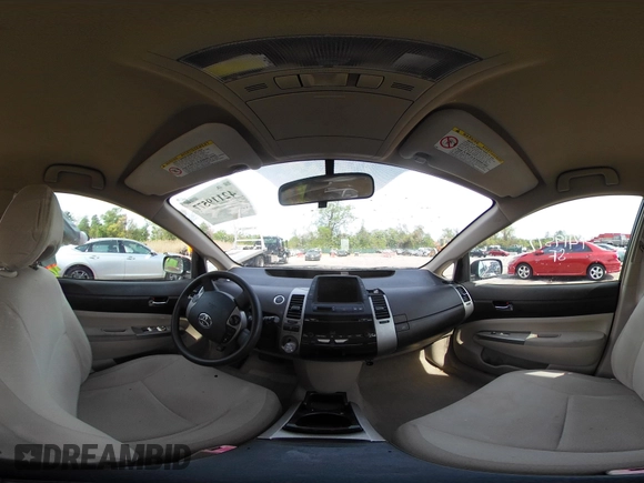 2005 Toyota Prius with VIN JTDKB20U957010252, listed as a IAAI auction lot 42119577 with 117,717 mi miles. Bid and sale history available at carsss.com. Image 20.