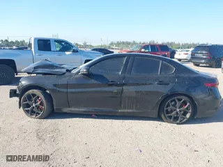 2020 Alfa Romeo Giulia with VIN ZARFAMAN9L7635597, listed as a IAAI auction lot 41888106 with 61,495 mi miles. Bid and sale history available at carsss.com. Image 14.