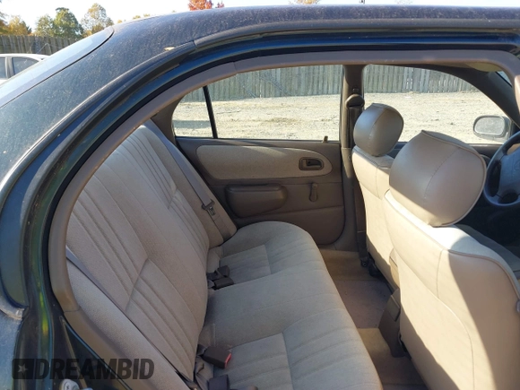 1997 Toyota Corolla with VIN 2T1BA02E0VC162383, listed as a IAAI auction lot 40715985 with 141,713 mi miles and . Bid and sale history available at DreamBid. Image 8.