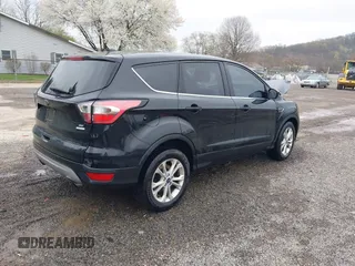 2017 Ford Escape SE with VIN 1FMCU0GD3HUC86839, listed as a IAAI auction lot 42017669 with 106,228 mi miles. Bid and sale history available at carsss.com. Image 4.