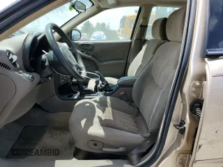 2004 Pontiac Grand Am SE1 with VIN 1G2NF52E74M568873, listed as a Copart auction lot 56187005 with 107,037 mi miles and Salvage title. Bid and sale history available at DreamBid. Image 7.