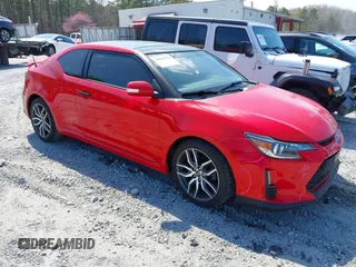 2015 Scion tC with VIN JTKJF5C77F3089140, listed as a IAAI auction lot 41884784 with 136,867 mi miles. Bid and sale history available at carsss.com. Image 1.