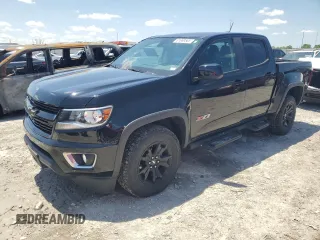 2018 Chevrolet Colorado 4WD Z71 z VIN 1GCGTDEN9J1195402, wystawiony jako Copart lot #61669565 z przebiegiem 96 590 mil mil oraz Szkoda całkowita • Salvage title. Historia ofert i sprzedaży dostępna na DreamBid. Obrazek 1.