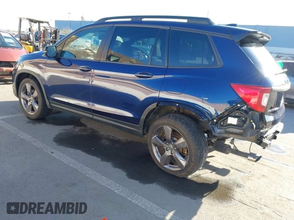 2020 Honda Passport Touring with VIN 5FNYF7H90LB004665, listed as a IAAI auction lot 41669821 with 59,768 mi miles and . Bid and sale history available at DreamBid. Image 3.