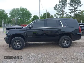 2016 Chevrolet Tahoe LT z VIN 1GNSKBKC6GR210329, wystawiony jako IAAI lot #42126175 z przebiegiem 190 207 mil mil oraz . Historia ofert i sprzedaży dostępna na DreamBid. Obrazek 13.