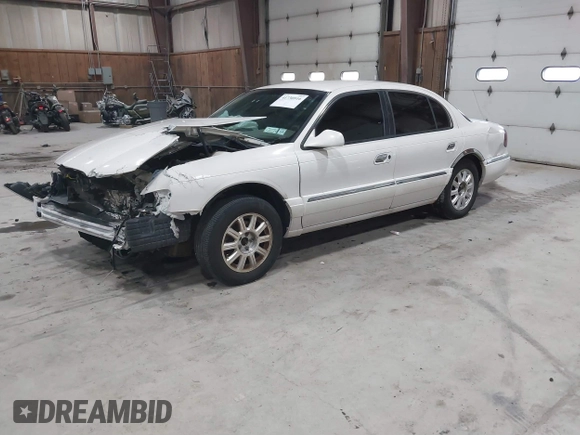 2001 Lincoln Continental with VIN 1LNHM97V81Y667328, listed as a IAAI auction lot 41730916 with 126,179 mi miles and . Bid and sale history available at DreamBid. Image 2.