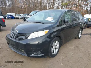 2016 Toyota Sienna L with VIN 5TDZK3DC7GS721298, listed as a IAAI auction lot 41727005 with 169,282 mi miles and . Bid and sale history available at DreamBid. Image 2.