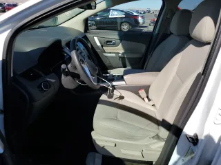 2014 Ford Edge SE z VIN 2FMDK3GC8EBB39954, wystawiony jako Copart lot #56427345 z przebiegiem 139 731 mil mil oraz Szkoda całkowita • Salvage title. Historia ofert i sprzedaży dostępna na DreamBid. Obrazek 7.