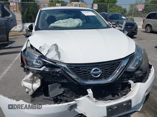 2018 Nissan Sentra S with VIN 3N1AB7AP6JY232812, listed as a IAAI auction lot 42088733 with 210,861 mi miles and . Bid and sale history available at DreamBid. Image 6.