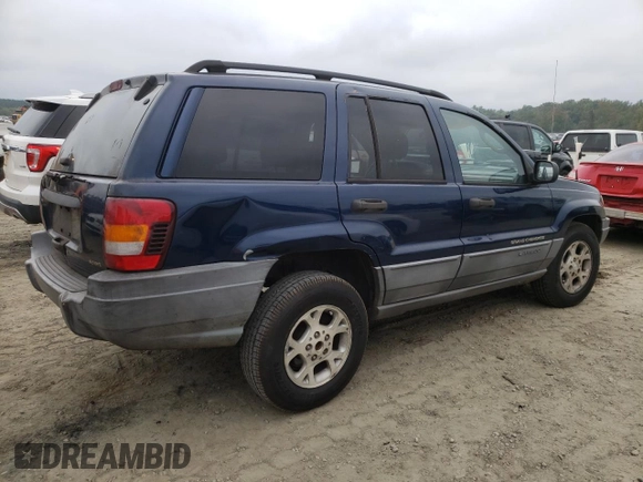 2002 Jeep Grand Cherokee z VIN 1J4GX38S42C229150, wystawiony jako Copart lot #72586834 z przebiegiem 201 103 mil mil oraz Szkoda całkowita • Salvage title. Historia ofert i sprzedaży dostępna na DreamBid. Obrazek 3.
