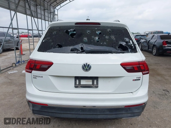 2018 Volkswagen Tiguan SEL with VIN 3VV2B7AX8JM120443, listed as a IAAI auction lot 42154773 with 70,256 mi miles and . Bid and sale history available at DreamBid. Image 16.