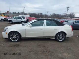 2007 Cadillac CTS z VIN 1G6DP577070131729, wystawiony jako IAAI lot #41717213 z przebiegiem 35 930 mil mil oraz . Historia ofert i sprzedaży dostępna na DreamBid. Obrazek 14.