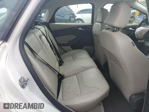 2016 Ford Focus Electric z VIN 1FADP3R41GL257400, wystawiony jako Copart lot #82003833 z przebiegiem 69 426 mil mil oraz . Historia ofert i sprzedaży dostępna na DreamBid. Obrazek 10.