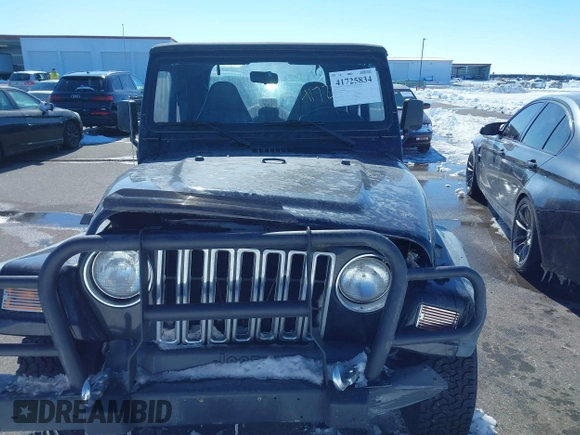 1999 Jeep Wrangler Sport with VIN 1J4FY19SXXP456810, listed as a IAAI auction lot 41725834 with 93,151 mi miles. Bid and sale history available at carsss.com. Image 12.
