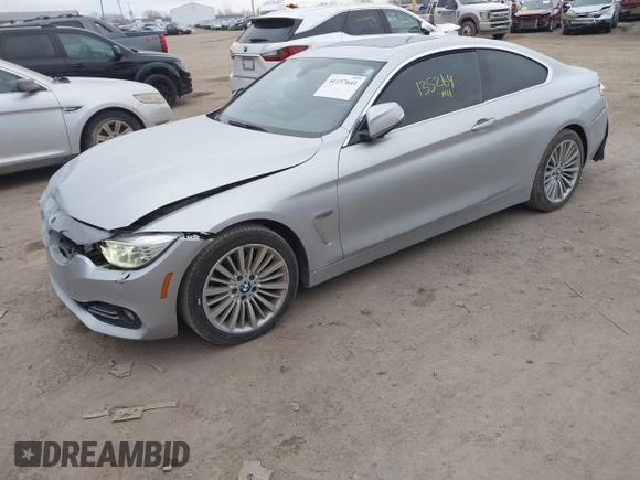 2014 BMW 4 Series 428i xDrive with VIN WBA3N5C53EF716542, listed as a IAAI auction lot 41157641 with 135,264 mi miles and . Bid and sale history available at DreamBid. Image 18.