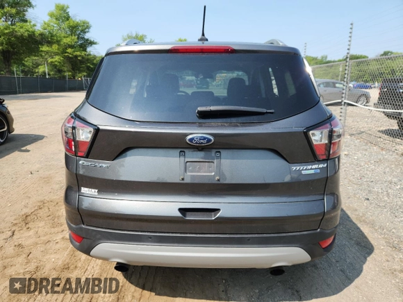 2018 Ford Escape Titanium with VIN 1FMCU9J90JUA15154, listed as a Copart auction lot 59768415 with 93,810 mi miles and Salvage title. Bid and sale history available at DreamBid. Image 6.