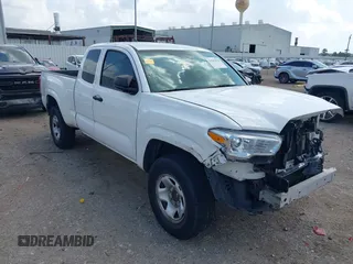 2016 Toyota Tacoma SR with VIN 5TFRX5GN7GX052955, listed as a IAAI auction lot 42547824 with 216,717 mi miles and . Bid and sale history available at DreamBid. Image 1.