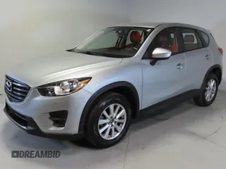 2016 Mazda CX-5 Sport with VIN JM3KE2BEXG0904597, listed as a Copart auction lot 42407975 with 63,343 mi miles and Salvage Title. Bid and sale history available at carsss.com. Image 2.