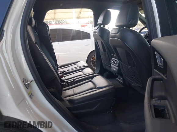 2019 Audi Q7 Premium with VIN WA1AAAF70KD037387, listed as a IAAI auction lot 41966996 with 93,245 mi miles and . Bid and sale history available at DreamBid. Image 8.