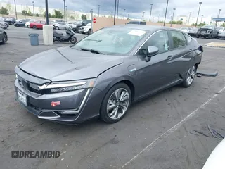 2018 Honda Clarity Plug-In Hybrid with VIN JHMZC5F14JC017006, listed as a IAAI auction lot 42064754 with 36,976 mi miles. Bid and sale history available at carsss.com. Image 2.