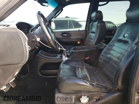 2002 Ford F-150 Harley Davidson with VIN 1FTRW07342KC78218, listed as a Copart auction lot 78273304 with 217,968 mi miles and Salvage Title. Bid and sale history available at carsss.com. Image 7.