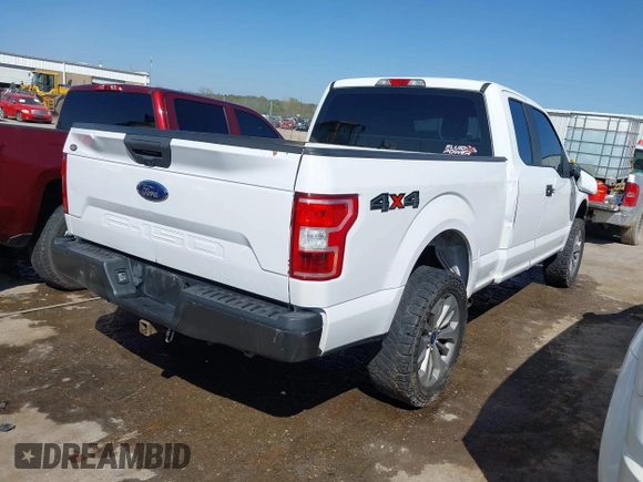2018 Ford F-150 XL with VIN 1FTFX1E50JKD54316, listed as a IAAI auction lot 41994745 with 210,156 mi miles and . Bid and sale history available at DreamBid. Image 4.