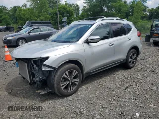 2017 Nissan Rogue SV with VIN JN8AT2MV5HW018617, listed as a Copart auction lot 63825575 with 81,501 mi miles and Salvage title. Bid and sale history available at DreamBid. Image 1.