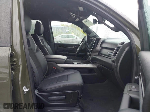2021 Ram 1500 Lone Star with VIN 1C6SRFFT6MN695393, listed as a IAAI auction lot 42344282 with 12,796 mi miles and . Bid and sale history available at DreamBid. Image 5.